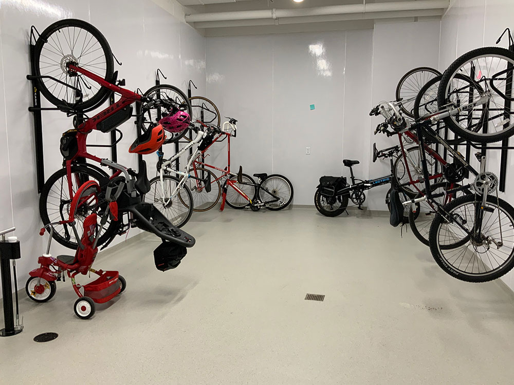 bike room with bikes hanging on the wall